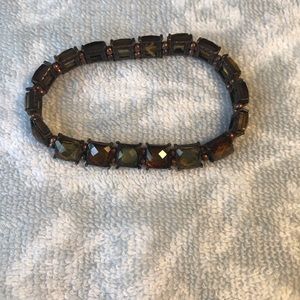 Green and brown bracelet.